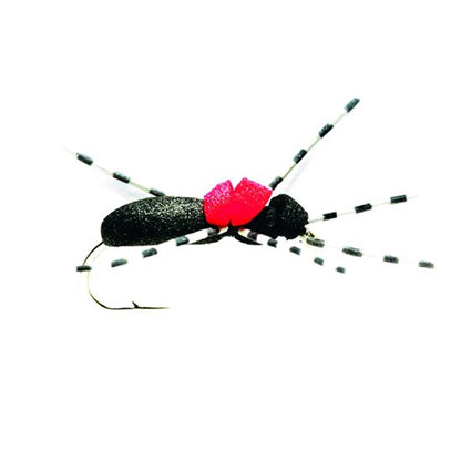 Schwarze Ameisen-Trockenfliege mit Schaumstoffkörper, schwarz-weiß gestreiften Gummibeinen und pinkroter Sichthilfe
